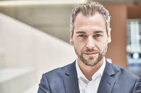 Portrait of confident young businessman stock photo