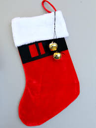 For a stronger hold, add a little glue onto the back of each decoration and let dry. How To Decorate A Christmas Stocking For Kids How Tos Diy