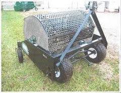 I'd rather have a metal diy compost tumbler, so i made my own! Tow Behind Drum Compost Spreader