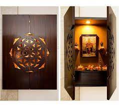 Two doors to enclose a deity inside. 31 Brilliant Puja Unit Designs For Indian Homes Zad Interiors
