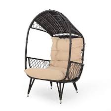 joanna outdoor wicker standing basket chair with cushion brown and tan gdf studio basket chair patio chairs outdoor wicker