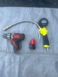 Payed $15 for all of this the drill works gotta test the battery later and  the air gauge turns on.