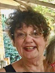 My sister passed away last year and I would love this photo to have a  better background possibly a garden. Thank you.