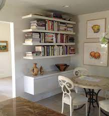 Maybe you would like to learn more about one of these? Floating File Cabinet Below With Floating Shelves Above Custom White Painted Wall System Floating Shelves Entertainment Center Family Room Remodel Wall Unit