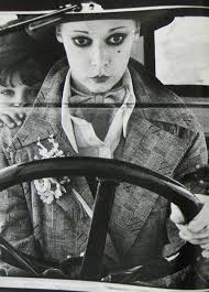 Sarah Moon, 1971...<3 the <3 shaped beauty mark (ala 20's with tiny  sweet-shaped lips) & shadow (above & below the eye). The 70's edgy makeup  went with the graphic fashions of that