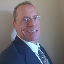 At Olive Manufacturing Group we're not just making bicycle rims. Here's a  wheelchair rim going through the drilling machine getting both the spoke  holes and the hand rim holes drilled.