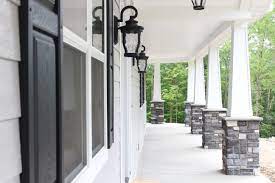 Farmhouse Look Black Shutters Grey Siding White Pillars Grey Stone White Exterior Houses Grey Stone House White House Black Shutters