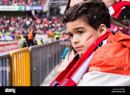 Child and football fan hi-res stock photography and images