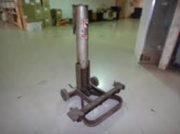 Image is a representation of this item. Gray Portamatic Car And Truck Air Lift Cei Electrical Mechanical Warehouse Clean Up By Fleetsale Equip Bid