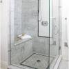Marble walk in shower with bench. 1