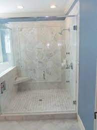 This faux carrara marble ensuite is now completely transformed. Shower Idea Marble Bathroom Designs Marble Bathroom Marble Tile Bathroom