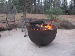 You can turn a rusty old cauldron or wheelbarrow that's seen better days into the centrepiece of your backyard. 30 Cheap Easy Diy Backyard Fire Pit Ideas For Outdoor Living 2021