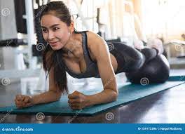Beautiful Asian Fitness Young Woman in Sportswear Doing Plank with Ball on  Mat in Gym . Sport Fit Girl Push Up Exercise in Morning Stock Photo - Image  of indoor, beautiful: 159172396