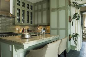 I have forest green granite counters in my kitchen. Gray Green Cabinets Cottage Kitchen Alys Beach