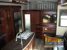 Maybe you would like to learn more about one of these? Evergreen Tesla 3950 Fifth Wheel Toy Hauler Deal Of The Year Topper S Camping Center