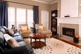 Blue Leather Sofa Living Room Traditional With Beige Armchair Beige Ottoman Jpg 990 660 Sofa Decor Black Leather Sofa Decor Sofa Design