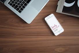 White Iphone On A Solid Wooden Table In 2020 White Iphone Iphone Mockup Phone Wallpapers Vintage