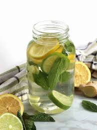 Measure 1/4 teaspoon of ginger powder and pour a cup of boiling water over it. Flavoured Water With Lemon Mint And Ginger Slow The Cook Down