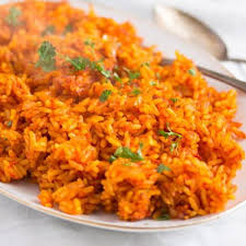 Once hot, add 1 tbsp oil (amount as original recipe is written // adjust if altering batch size) and cauliflower rice. Nigerian Jollof Rice With Tomatoes And Spices