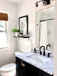 Here is our small bathroom before i started tearing it apart like it was demo day on fixer upper. Hideous To Heavenly Our Hallway Bathroom Remodel Reveal Sima Spaces