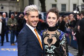 Lily collins and zac efron star in the new netflix film extremely wicked, shockingly evil and vile, which centers on the relationship between ted bundy and his former girlfriend, liz. Zac Efron Lily Collins Extremely Wicked Shockingly Evil And Vile London Premiere Red Carpet Fashion Elie Saab Tom Lorenzo Site 1 Tom Lorenzo