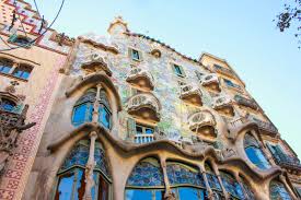 Casa batllo is a gaudi building with polychrome facade decorated with ceramic and glass. Casa Batllo The Other Gaudi Building You Need To See Besides Segrada Familia The Petite Wanderess