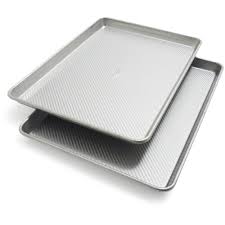 Jelly roll pans are typically available in either 15 ½ by 10 ½ inches or 18 by 12 a.k.a. Sur La Table Platinum Pro Half Sheet Pans 17 25 X 12 25 Set Of 2 Sur La Table