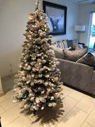 Choose from alberta spruce, douglas fir, virginia pine, flocked and accented. Holiday Time Flocked Pine Christmas Tree 6 5 Ft White On Green Walmart Com Walmart Com