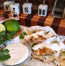 In a small bowl combine mayonnaise, sour cream, juice of one lime, chopped cilantro, dill weed, hot pepper, oregano, capers, chipotle chili, and cumin. Easy Fish Tacos With Amazing Taco Sauce Norine S Nest