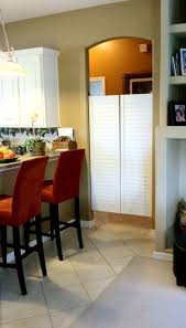 Norman Shutters Installed As Saloon Doors Beautiful Way To Separate Spaces Designed Installed By Shade Swinging Doors Kitchen Interior Barn Doors Home Decor