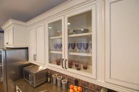 Kraftmaid® inset light rail molding for kitchen cabinets has many different applications. Closeup Of Shaker Style Doors Refinished To A Custom White Painted Finish Notice The New Crown Shaker Style Cabinets Refinishing Cabinets Shaker Style Doors
