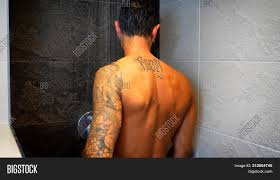 This depends on the type of covering the artist uses on your tattoo and how long they recommend keeping it on. Close Attractive Young Image Photo Free Trial Bigstock