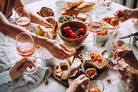 Use packaged dipping sauces, or make your own. Friends Having A Dinner Party With Different Kinds Of Appetizers And Rose Wine Stock Photo Picture And Royalty Free Image Image 110132262