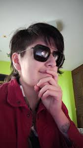 Wearing sunglasses so no one can see what I'm looking at