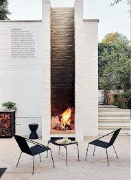 Garden Outdoor Fireplace Firepit Statement Brick Piece Monochrome Black And White Modern Minimal Outdoor Fireplace Backyard Design Modern Outdoor