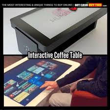 Browse the web while drinking a coffee and socialising; Interactive Coffee Table With Touch Screen New Age Dining