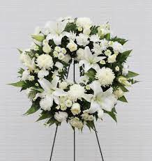 Flowers are not typically displayed at a funeral home where the service for the deceased is held; Wages Sons Funeral Home Sympathy Flowers Local Same Day Delivery Hall S Flower Shop