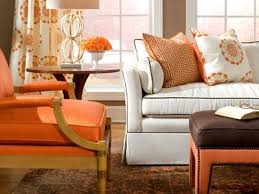 This list of gorgeous spaces proves that a white living room can be the most inviting place in your house. Love This White Brown Piping Sofa White Brown Orange Living Room Living Room Orange Home Goods Decor Living Room Furniture