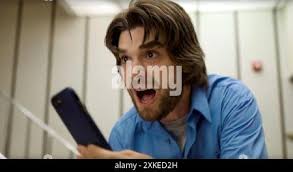 SCARED SHITLESS, Daniel Doheny, 2024. © Happy Cat Productions /Courtesy  Everett Collection Stock Photo