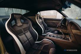 1970 Boss 302 Ford Mustang The Interior Is A Bespoke Combination Of Brown Leather And Plaid Cloth And It Ford Mustang Boss Ford Mustang Boss 302 Mustang Boss