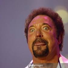 Joe Rogan looks like if Gru had a baby with a Minion.