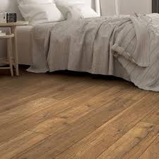 Put simply, wood floors are entirely made of wood, whereas laminate floors are a printed copy of wood. Laminate