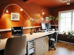 In the picture above a small home office features a large glass door leading from a terrace providing a bright and efficient space for working. Functional Home Office Lighting Ideas Best Office Lighting Options