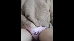 woman in stockings, thong with hello kitty and pink anal plug jerks off  with black dildo close up