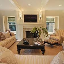 We love how he's layered artwork atop his fireplace mantel and created a tonal display using magazines and. Living Room And Fireplace Love This Arrangement Simplicity Traditional Family Rooms Simple Living Room Designs Home Living Room