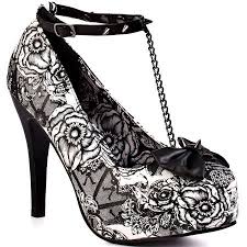 The Opposite Of Classy Iron Fist Wedding Shoes All Up In Your Eyeballs Offbeat Bride Love Love Love These Sho Iron Fist Shoes Wedding Shoes Platform Heels
