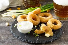 Fill the gap between the rings with strips of mozzarella. Snack Food Onion Rings Fried Mozzarella Cheese Sauce And Beer Stock Photo Picture And Royalty Free Image Image 73125342
