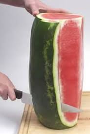 Slice off both ends of the melon with a knife. All About Watermelon How To Cooking Tips Recipetips Com