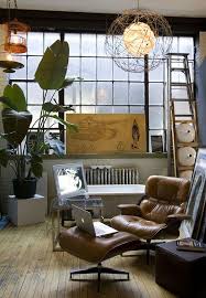 30 Eye Catching Interiors Featuring The Iconic Eames Lounge Chair Eames Lounge Chair Vintage Interiors Interior Design Inspiration