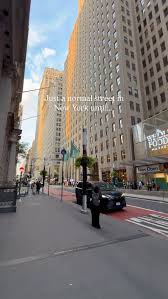 A sidewalk plaque honoring Jawaharlal ...